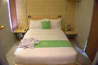 Kamar Tidur Mahan Kedaton Hotel Lampung Managed by Pradiza Hospitality