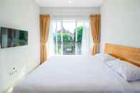 ห้องนอน Dharma Guest House RedPartner