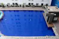 Swimming Pool Homey and Good Deal 2BR Apartment at Green Pramuka City By Travelio