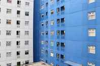 Lobi Homey and Good Deal 2BR Apartment at Green Pramuka City By Travelio