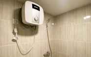 In-room Bathroom 3 Comfy and Best Deal Studio Vasanta Innopark Apartment By Travelio