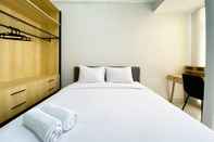 Bedroom Comfy and Best Deal Studio Vasanta Innopark Apartment By Travelio