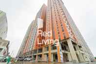 Bangunan RedLiving Apartemen Transpark Juanda - Icha Rooms Tower Jade with Netflix