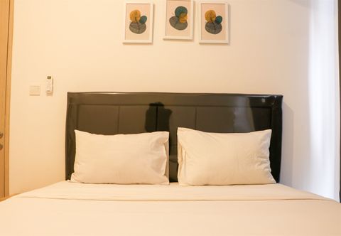 침실 Enjoy Living and Cozy 2BR at Tokyo Riverside PIK 2 Apartment By Travelio