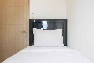 Kamar Tidur 4 Enjoy Living and Cozy 2BR at Tokyo Riverside PIK 2 Apartment By Travelio