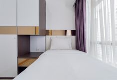 Bedroom 2 Nice and Warm 2BR Apartment at M-Town Residence By Travelio