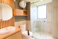 In-room Bathroom Warm and Comfort Living 3BR at Meikarta Apartment By Travelio