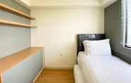 Bedroom 3 Warm and Comfort Living 3BR at Meikarta Apartment By Travelio