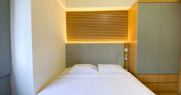 Bedroom Warm and Comfort Living 3BR at Meikarta Apartment By Travelio