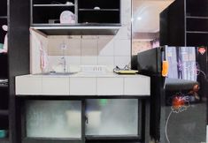 Common Space 2 Look Simply Studio Room at 11st Floor Paramount Skyline Apartment By Travelio