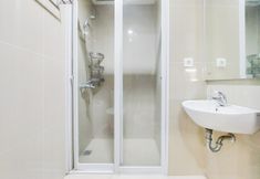 In-room Bathroom 3 Look Simply Studio Room at 11st Floor Paramount Skyline Apartment By Travelio