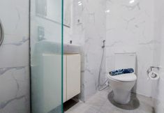 In-room Bathroom 3 Elegant and Good Studio at Pacific Garden Apartment By Travelioent By Travelio