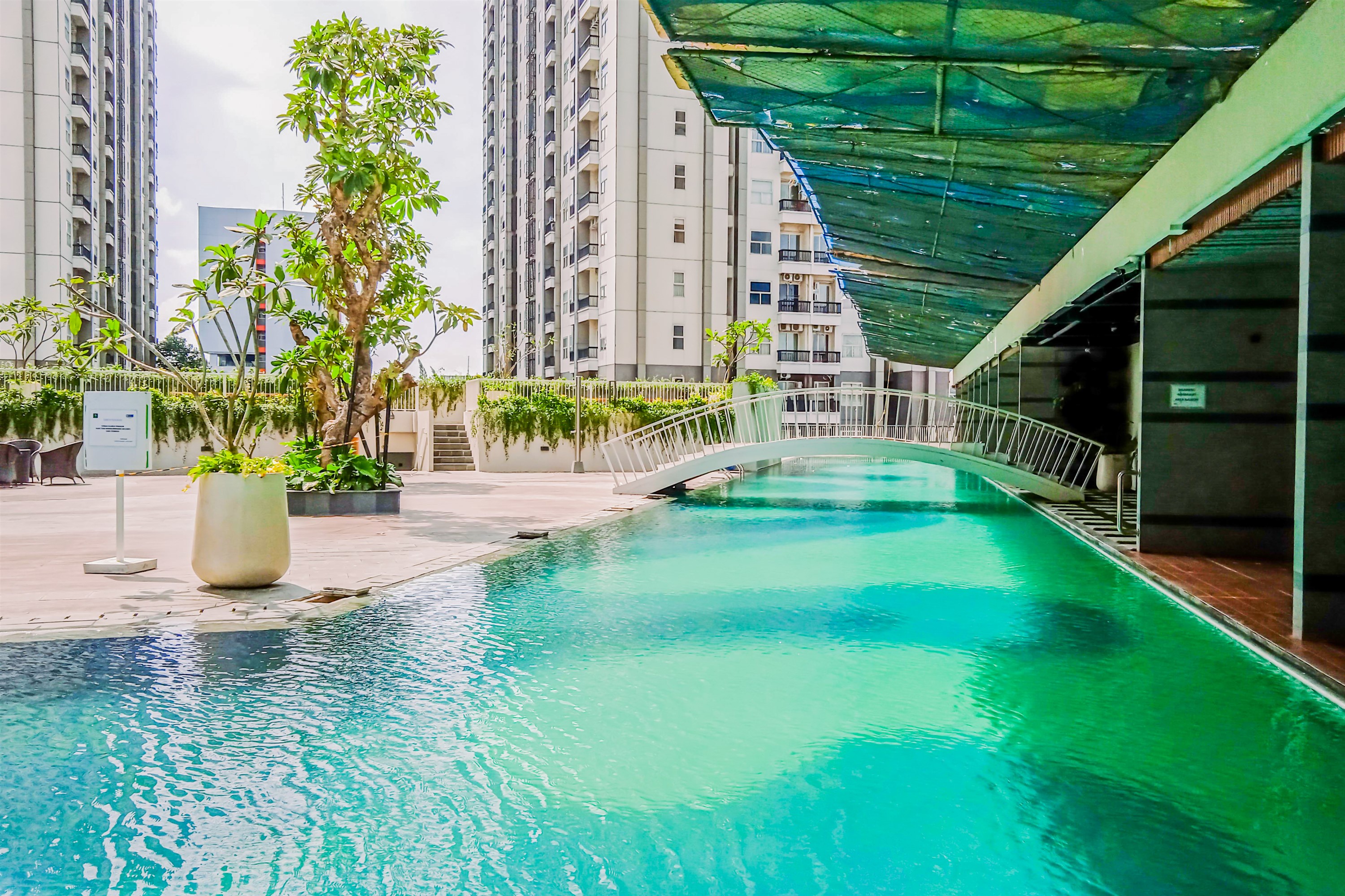 Swimming Pool 4 Elegant and Good Studio at Pacific Garden Apartment By Travelioent By Travelio