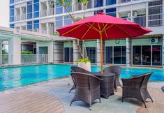 Lobby 5 Elegant and Good Studio at Pacific Garden Apartment By Travelioent By Travelio