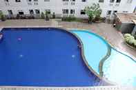 Swimming Pool Enjoy and Cozy Studio Room at Green Pramuka City Apartment By Travelio