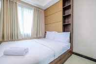 Bedroom Stay Cozy 1BR at Sky Terrace Apartment By Travelio
