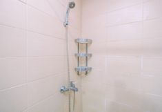 In-room Bathroom 5 Nice and Comfort 2BR at Belmont Residence Puri Apartment By Travelio