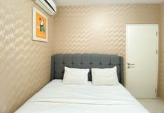 Bedroom 2 Elegant and Comfort 4BR Combined at Springlake Summarecon Bekasi Apartment By Travelio