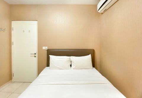 Bedroom Elegant and Comfort 4BR Combined at Springlake Summarecon Bekasi Apartment By Travelio