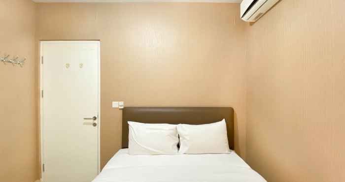 Phòng ngủ Elegant and Comfort 4BR Combined at Springlake Summarecon Bekasi Apartment By Travelio