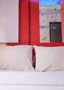 BEDROOM 2BR Best Deal at Suites @Metro Apartment By Travelio