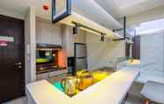 Common Space 3 Tidy and Modern 1BR Apartment at Nine Residence By Travelio