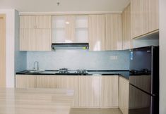 Common Space 4 Elegant and Spacious 2BR at 35th Floor Hillcrest House Apartment By Travelio