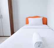 Bedroom 2 2BR Homey Apartment at Dago Suites By Travelio