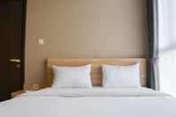 Bedroom Homey and Wonderful 1BR Ciputra International Apartment By Travelio