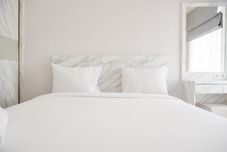 Bedroom Comfy and Modern Look Studio Citra Living Apartment By Travelio