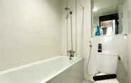 In-room Bathroom 5 Homey 2BR Crown Court Executive Condominium Apartment By Travelio