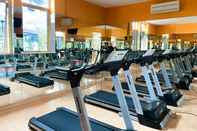 Fitness Center Homey 2BR Crown Court Executive Condominium Apartment By Travelio