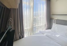 Kamar Tidur 2 Elegant and Nice 2BR at Menteng Park Apartment By Travelio