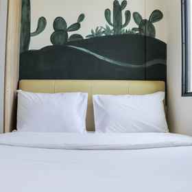 Bedroom 1 สตูดิโอเรียบง่ายและเงียบสงบที่ Osaka Riverview PIK 2 Apartment By Travelio, โรงแรม & ที่พัก CSCODS Nice Project PIK 2