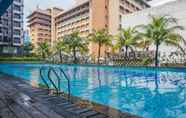 Swimming Pool 6 Cozy Stay and Modern 1BR at Tamansari Semanggi Apartment By Travelio