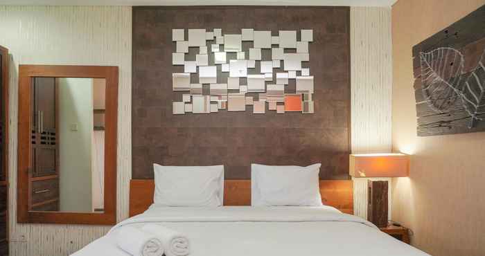 Bedroom Cozy Stay and Modern 1BR at Tamansari Semanggi Apartment By Travelio