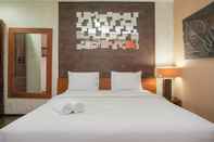 Bedroom Cozy Stay and Modern 1BR at Tamansari Semanggi Apartment By Travelio