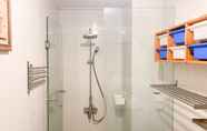 In-room Bathroom 5 Cozy Stay and Modern 1BR at Tamansari Semanggi Apartment By Travelio