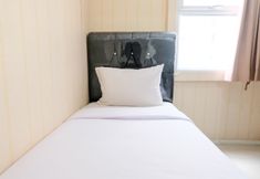 Bedroom 2 2BR Homey Apartment at Parahyangan Residence By Travelio