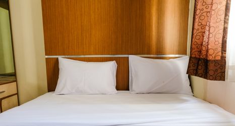 Bedroom 2 2BR Homey at Suites @Metro Apartment By Travelio