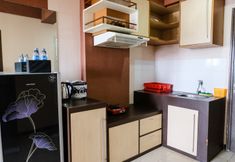 Common Space 4 2BR Homey at Suites @Metro Apartment By Travelio