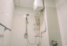 In-room Bathroom 5 Cozy Stay and Nice 2BR Akasa Pure Living BSD Apartment By Travelio