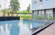 Swimming Pool 4 Stay Cozy Studio at Urbantown Serpong Apartment By Travelio