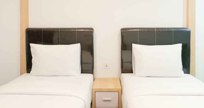 Kamar Tidur Cozy Studio Room Apartment at De Prima By Travelio