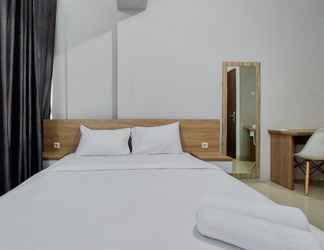 Bedroom 2 Modern and Restful 2BR Majestic Point Serpong Apartment By Travelio