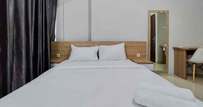 ห้องนอน Modern and Restful 2BR Majestic Point Serpong Apartment By Travelio