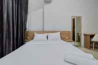 Kamar Tidur Modern and Restful 2BR Majestic Point Serpong Apartment By Travelio