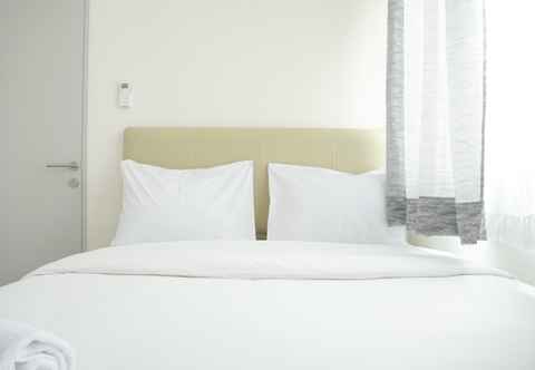 Kamar Tidur Homey and Simply Look 1BR Osaka Riverview PIK 2 Apartment By Travelio