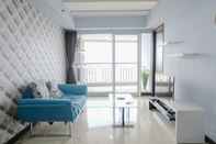 Common Space Cozy and Homey 1BR Apartment at Braga City Walk By Travelio