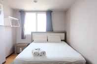 Bedroom Cozy and Homey 1BR Apartment at Braga City Walk By Travelio